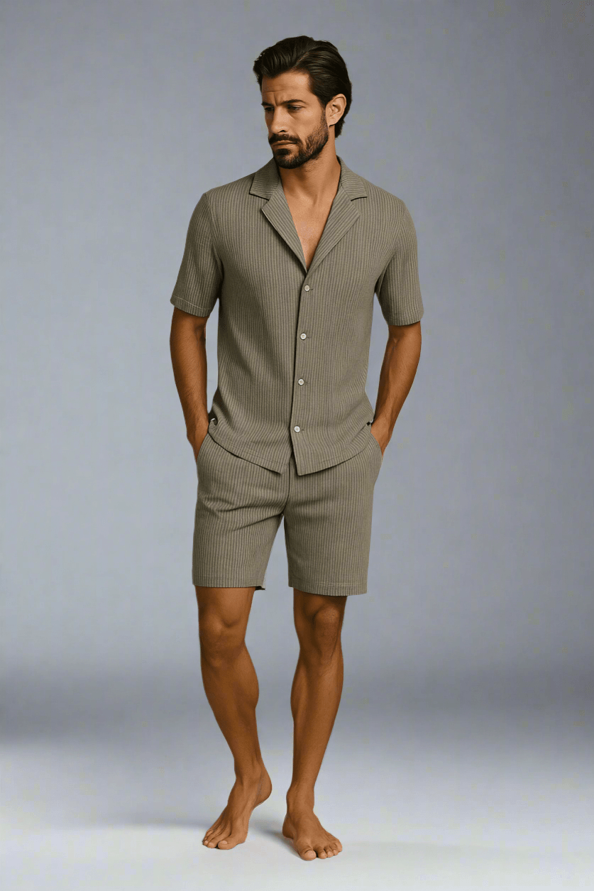 man wearing short-sleeve button-up shirt and matching pants set